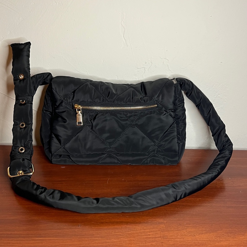 Black Crossbody Bag with Adjustable Strap and Soft Fabric